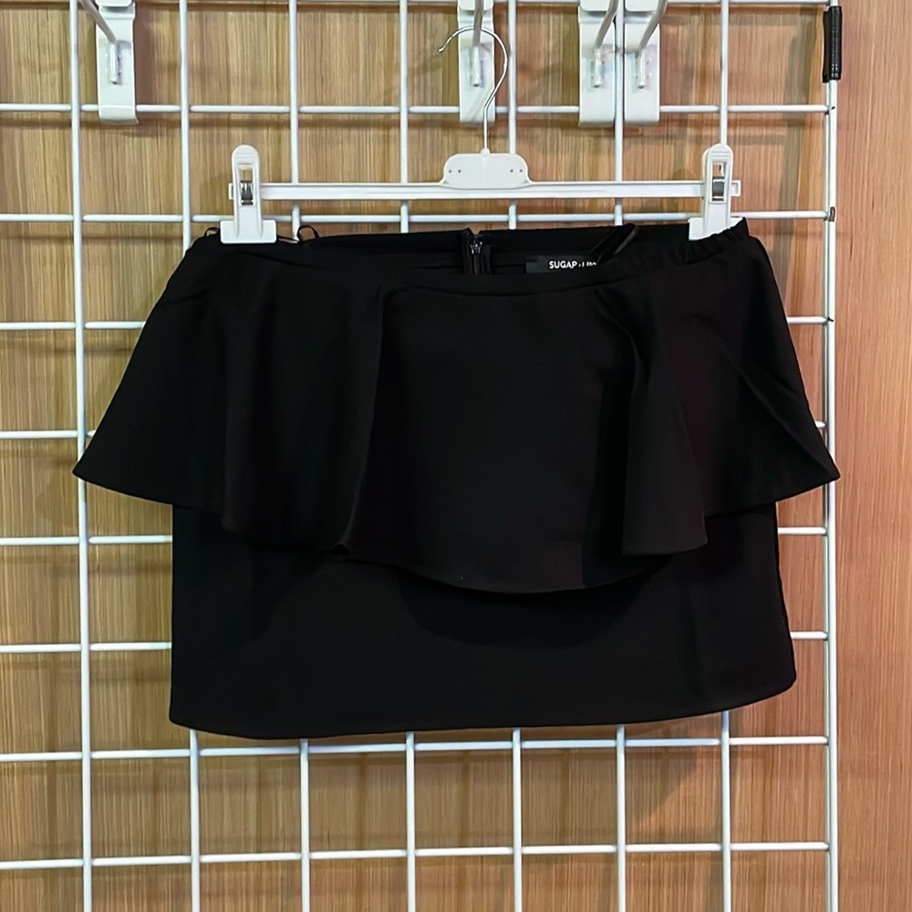 SugarLips black mini skirt. Clasp and zipper back. NWT